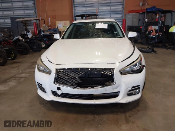 2014 Infiniti Q50 Premium z VIN JN1BV7AP0EM679026, wystawiony jako IAAI lot #42225108 z przebiegiem 96 656 mil mil oraz . Historia ofert i sprzedaży dostępna na DreamBid. Obrazek 13.
