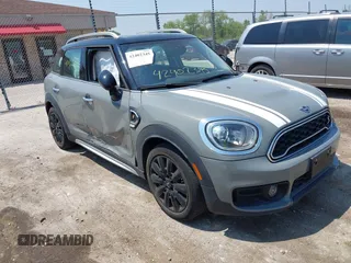 2020 MINI Countryman Cooper S with VIN WMZYX1C08L3L66257, listed as a IAAI auction lot 42402345 with 28,609 mi miles and . Bid and sale history available at DreamBid. Image 1.