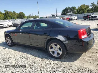 2010 Dodge Charger Police with VIN 2B3AA4CT2AH203453, listed as a Copart auction lot 69824824 with 195,153 mi miles and Salvage Title. Bid and sale history available at DreamBid. Image 2.