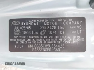 2005 Hyundai Accent GLS with VIN KMHCG35C85U354423, listed as a IAAI auction lot 41939445 with 134,952 mi miles. Bid and sale history available at carsss.com. Image 9.