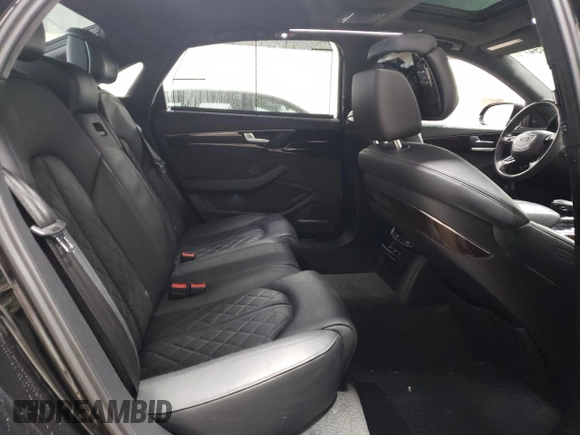 2015 Audi A8 4.0T z VIN WAU32AFD0FN017865, wystawiony jako Copart lot #37065594 z przebiegiem 55 632 mil mil oraz Szkoda całkowita • Salvage title. Historia ofert i sprzedaży dostępna na DreamBid. Obrazek 10.