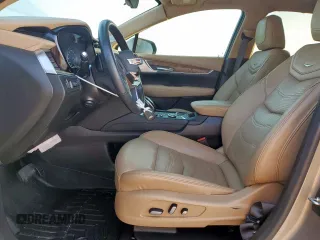 2022 Cadillac XT5 Premium Luxury FWD z VIN 1GYKNERS9NZ120517, wystawiony jako Copart lot #58978045 z przebiegiem 31 456 mil mil oraz Szkoda całkowita • Salvage title. Historia ofert i sprzedaży dostępna na DreamBid. Obrazek 7.