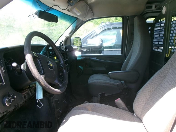 2011 Chevrolet Express Cargo with VIN 1GCWGFCB7B1123426, listed as a IAAI auction lot 42573299 with Not provided miles and . Bid and sale history available at DreamBid. Image 2.
