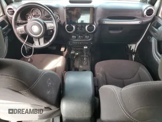 2014 Jeep Wrangler Unlimited Sahara z VIN 1C4BJWEG9EL102336, wystawiony jako Copart lot #55391335 z przebiegiem Nie podano mil oraz Szkoda całkowita • Salvage title. Historia ofert i sprzedaży dostępna na DreamBid. Obrazek 8.