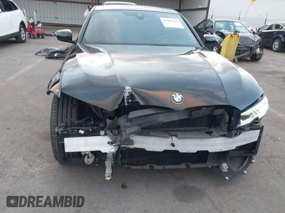 2021 BMW 3 Series 330i with VIN 3MW5R1J07M8B47179, listed as a IAAI auction lot 41450153 with 66,689 mi miles. Bid and sale history available at carsss.com. Image 6.