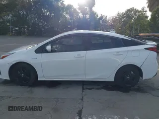 2021 Toyota Prius L Eco z VIN JTDKAMFU9M3131228, wystawiony jako IAAI lot #41257117 z przebiegiem 72 840 mil mil oraz . Historia ofert i sprzedaży dostępna na DreamBid. Obrazek 15.