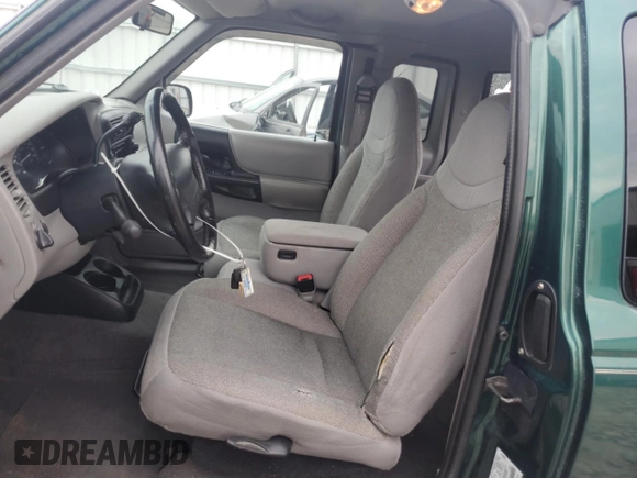 2000 Ford Ranger XLT with VIN 1FTZR15X7YTA02430, listed as a Copart auction lot 59917055 with 152,672 mi miles and Non repairable. Bid and sale history available at DreamBid. Image 7.