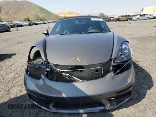 2019 Porsche 718 Boxster z VIN WP0CA2A80KS211281, wystawiony jako Copart lot #68340883 z przebiegiem 27 151 mil mil oraz . Historia ofert i sprzedaży dostępna na DreamBid. Obrazek 5.
