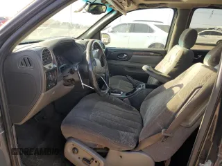 2004 GMC Envoy SLE with VIN 1GKDT13S042404250, listed as a Copart auction lot 52672455 with 230,610 mi miles and Salvage Title. Bid and sale history available at carsss.com. Image 7.