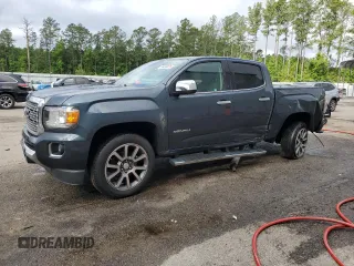 2019 GMC Canyon 4WD Denali z VIN 1GTG6EEN6K1272872, wystawiony jako Copart lot #56498825 z przebiegiem 73 861 mil mil oraz Szkoda całkowita • Salvage title. Historia ofert i sprzedaży dostępna na DreamBid. Obrazek 1.