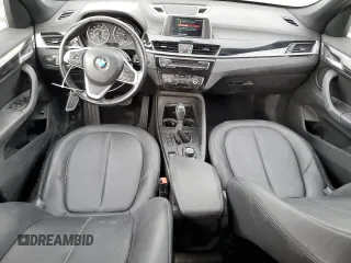 2018 BMW X1 sDrive28i with VIN WBXHU7C37J5H44386, listed as a Copart auction lot 42167135 with 96,668 mi miles and Salvage Title. Bid and sale history available at DreamBid. Image 8.