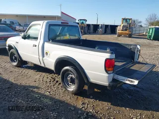 1999 Mazda B-Series 2WD Truck SX with VIN 4F4YR12C2XTM30361, listed as a IAAI auction lot 41439064 with 147,901 mi miles. Bid and sale history available at carsss.com. Image 3.