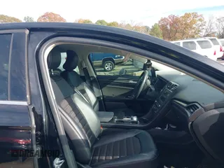 2018 Ford Fusion SE with VIN 3FA6P0HDXJR157605, listed as a IAAI auction lot 40979897 with 128,322 mi miles. Bid and sale history available at carsss.com. Image 5.