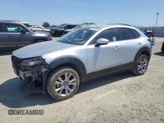 2020 Mazda CX-30 Select with VIN 3MVDMACL5LM136111, listed as a Copart auction lot 55131105 with 77,533 mi miles and Salvage title. Bid and sale history available at DreamBid. Image 1.