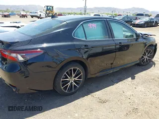 2023 Toyota Camry SE with VIN 4T1G11AK1PU800063, listed as a IAAI auction lot 42121633 with 41,572 mi miles. Bid and sale history available at carsss.com. Image 4.