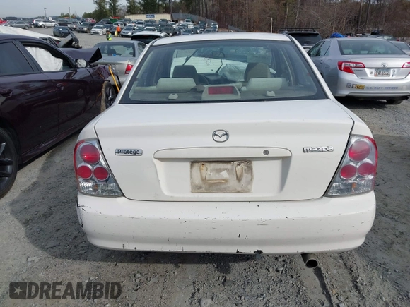 2000 Mazda Protege DX with VIN JM1BJ2221Y0208156, listed as a IAAI auction lot 41609657 with 435,304 mi miles and . Bid and sale history available at DreamBid. Image 15.