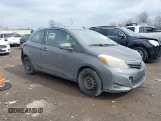 2013 Toyota Yaris L with VIN JTDJTUD30DD568688, listed as a IAAI auction lot 41665697 with 174,007 mi miles. Bid and sale history available at carsss.com. Image 1.