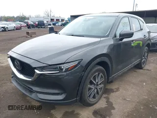 2017 Mazda CX-5 Grand Touring with VIN JM3KFBDL3H0143194, listed as a IAAI auction lot 42049258 with 74,159 mi miles. Bid and sale history available at carsss.com. Image 2.