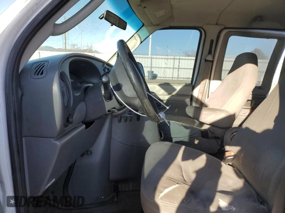 2005 Ford Econoline Passenger XL with VIN 1FBNE31L15HB23580, listed as a Copart auction lot 85060224 with 222,935 mi miles and Salvage Title. Bid and sale history available at carsss.com. Image 7.