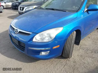 2010 Hyundai Elantra Touring SE with VIN KMHDC8AE0AU052512, listed as a IAAI auction lot 42123818 with 243,070 mi miles. Bid and sale history available at carsss.com. Image 6.