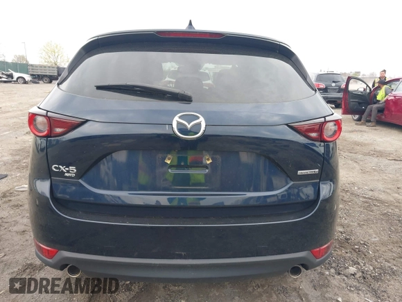 2021 Mazda CX-5 Touring with VIN JM3KFBCM1M1336457, listed as a IAAI auction lot 42034330 with 39,910 mi miles. Bid and sale history available at carsss.com. Image 15.