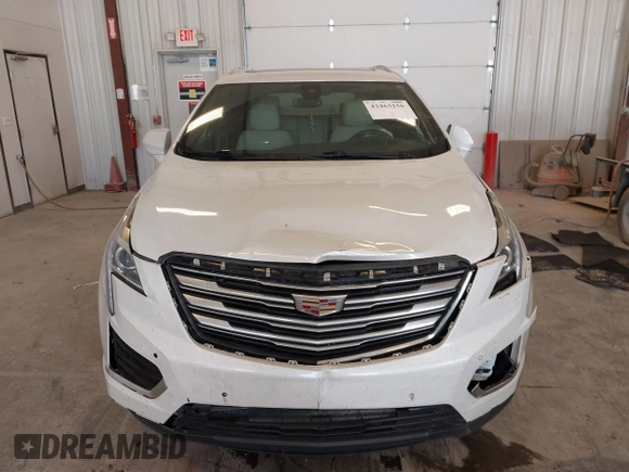 2018 Cadillac XT5 Luxury AWD z VIN 1GYKNDRS9JZ248969, wystawiony jako IAAI lot #42463156 z przebiegiem 90 271 mil mil oraz . Historia ofert i sprzedaży dostępna na DreamBid. Obrazek 6.