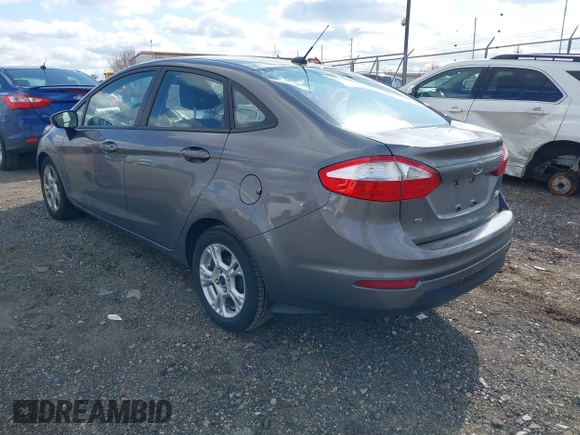 2014 Ford Fiesta SE with VIN 3FADP4BJ1EM199936, listed as a IAAI auction lot 41988670 with 44,846 mi miles and . Bid and sale history available at DreamBid. Image 3.