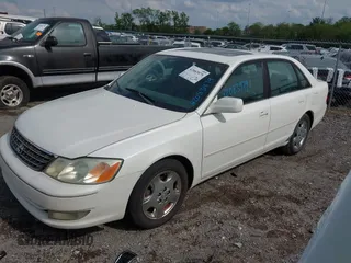 2003 Toyota Avalon XL with VIN 4T1BF28B73U321678, listed as a IAAI auction lot 42083979 with 283,606 mi miles and . Bid and sale history available at carsss.com. Image 2.