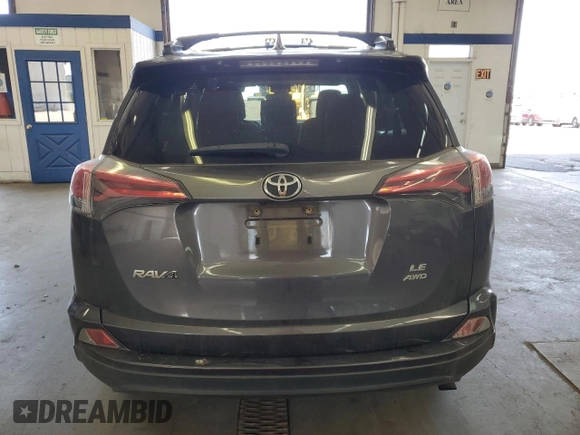 2018 Toyota RAV4 LE with VIN JTMBFREV9JJ743672, listed as a Copart auction lot 62510955 with 141,971 mi miles and Salvage title. Bid and sale history available at DreamBid. Image 6.