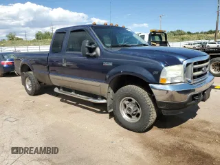 2002 Ford Super Duty F-250 XL with VIN 1FTNX21S92EC88121, listed as a Copart auction lot 68001114 with 145,635 mi miles and Clean Title. Bid and sale history available at carsss.com. Image 4.