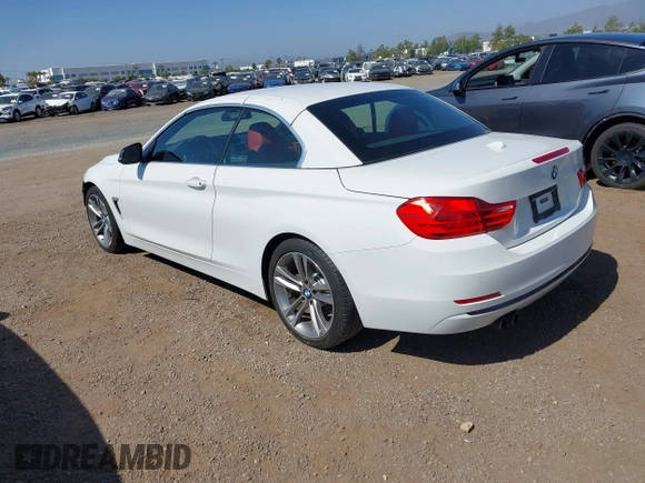 2015 BMW 4 Series 428i z VIN WBA3V7C58FP771642, wystawiony jako IAAI lot #42524828 z przebiegiem 64 440 mil mil oraz . Historia ofert i sprzedaży dostępna na DreamBid. Obrazek 3.