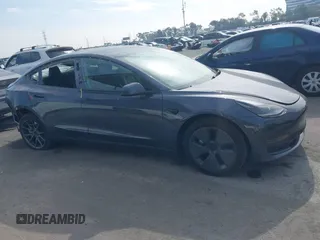 2023 Tesla Model 3 z VIN 5YJ3E1EA0PF577869, wystawiony jako IAAI lot #41468956 z przebiegiem 38 760 mil mil oraz . Historia ofert i sprzedaży dostępna na DreamBid. Obrazek 13.