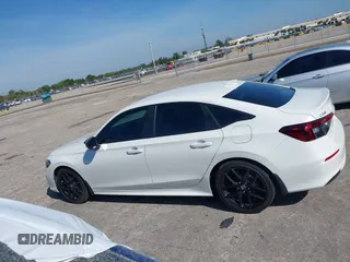 2025 Honda Civic Sport z VIN 2HGFE2F50SH544704, wystawiony jako IAAI lot #41881525 z przebiegiem 2954 mil mil oraz . Historia ofert i sprzedaży dostępna na DreamBid. Obrazek 14.