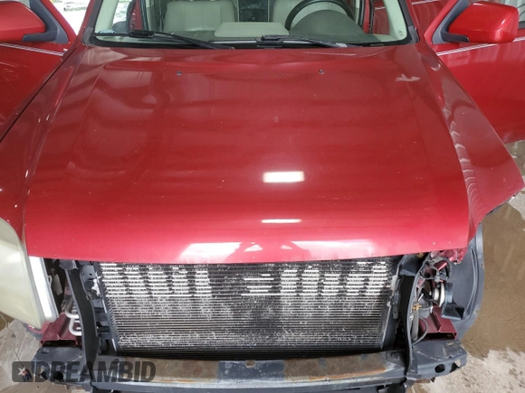 2008 Mercury Mariner Premier z VIN 4M2CU97118KJ52951, wystawiony jako Copart lot #61640225 z przebiegiem 186 109 mil mil oraz Szkoda całkowita • Salvage title. Historia ofert i sprzedaży dostępna na DreamBid. Obrazek 12.