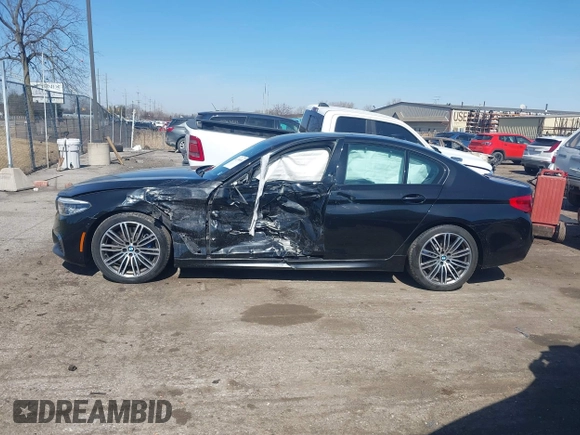 2019 BMW 5 Series M550i xDrive with VIN WBAJB9C51KB464879, listed as a IAAI auction lot 41774834 with 77,379 mi miles and . Bid and sale history available at DreamBid. Image 14.