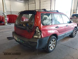 2004 Subaru Forester X with VIN JF1SG63624H737043, listed as a IAAI auction lot 42386762 with 234,240 mi miles and . Bid and sale history available at DreamBid. Image 4.