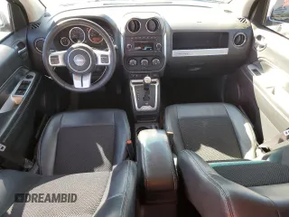 2015 Jeep Compass Latitude with VIN 1C4NJCEB2FD401761, listed as a Copart auction lot 49215505 with 154,896 mi miles and Salvage Title. Bid and sale history available at carsss.com. Image 8.