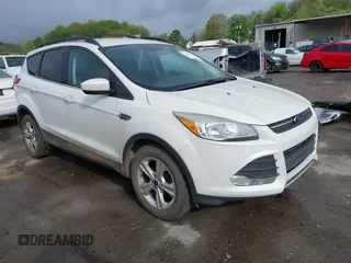2015 Ford Escape SE with VIN 1FMCU9G91FUB27234, listed as a IAAI auction lot 42157947 with 210,034 mi miles. Bid and sale history available at carsss.com. Image 1.