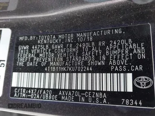 2019 Toyota Camry LE z VIN 4T1B11HK7KU702244, wystawiony jako IAAI lot #42073380 z przebiegiem 72 602 mil mil oraz . Historia ofert i sprzedaży dostępna na DreamBid. Obrazek 9.