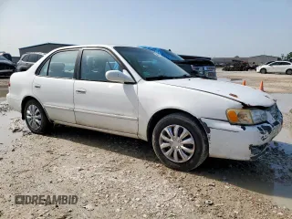 2002 Toyota Corolla CE with VIN 1NXBR12E32Z592708, listed as a Copart auction lot 62866195 with 226,871 mi miles and Clean title. Bid and sale history available at DreamBid. Image 4.