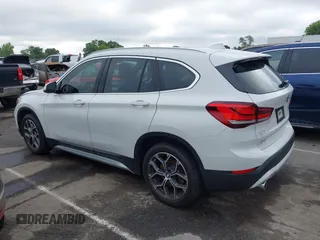 2021 BMW X1 xDrive28i with VIN WBXJG9C01M5S06181, listed as a IAAI auction lot 42292167 with 55,966 mi miles and . Bid and sale history available at DreamBid. Image 14.