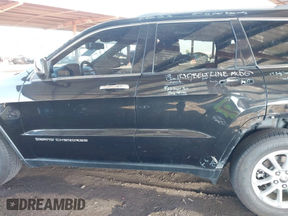 2014 Jeep Grand Cherokee Laredo with VIN 1C4RJEAG3EC472714, listed as a IAAI auction lot 40980100 with 124,603 mi miles. Bid and sale history available at carsss.com. Image 15.