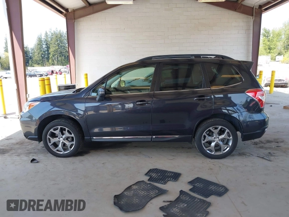 2016 Subaru Forester Touring with VIN JF2SJAXC0GH564305, listed as a IAAI auction lot 42111356 with 75,529 mi miles and . Bid and sale history available at DreamBid. Image 14.