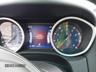 2015 Maserati Ghibli z VIN ZAM57XSA4F1151843, wystawiony jako IAAI lot #38392898 z przebiegiem 88 147 mil mil oraz . Historia ofert i sprzedaży dostępna na DreamBid. Obrazek 7.