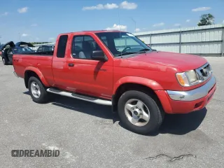2000 Nissan Frontier XE z VIN 1N6ED26Y7YC392971, wystawiony jako Copart lot #61301035 z przebiegiem 182 149 mil mil oraz Czysty tytuł • Clean title. Historia ofert i sprzedaży dostępna na DreamBid. Obrazek 4.