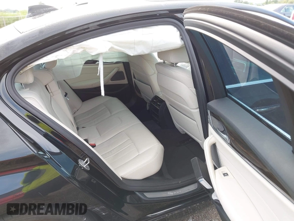 2017 BMW 5 Series 530i with VIN WBAJA5C39HG455823, listed as a IAAI auction lot 42840957 with 53,809 mi miles and . Bid and sale history available at DreamBid. Image 8.