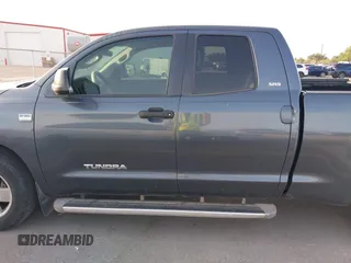 2007 Toyota Tundra SR5 with VIN 5TFRT54117X006566, listed as a IAAI auction lot 42074633 with 277,024 mi miles and . Bid and sale history available at DreamBid. Image 14.