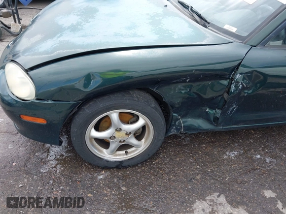 2002 Mazda MX-5 Miata Cloth z VIN JM1NB353720222073, wystawiony jako IAAI lot #42225042 z przebiegiem 94 992 mil mil oraz . Historia ofert i sprzedaży dostępna na DreamBid. Obrazek 6.