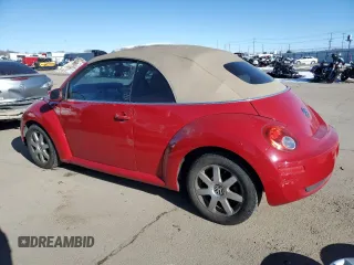2010 Volkswagen Beetle with VIN 3VWRG3AL1AM005636, listed as a Copart auction lot 44068415 with 57,056 mi miles and Salvage Title. Bid and sale history available at DreamBid. Image 2.