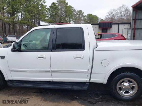 2001 Ford F-150 SuperCrew XLT with VIN 1FTRW07LX1KE14432, listed as a IAAI auction lot 41802811 with 192,696 mi miles. Bid and sale history available at carsss.com. Image 15.